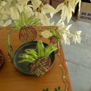 Pair of beaded pineapple candle holders